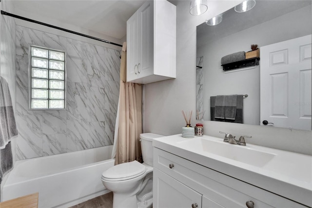 full bathroom with shower / bath combo with shower curtain, toilet, wood finished floors, and vanity