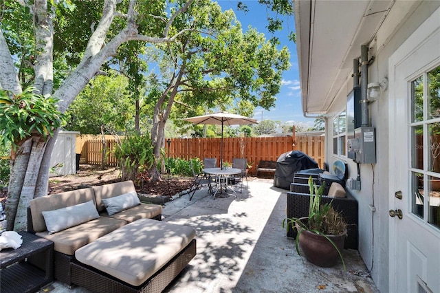 view of patio / terrace with outdoor dining area and a fenced backyard