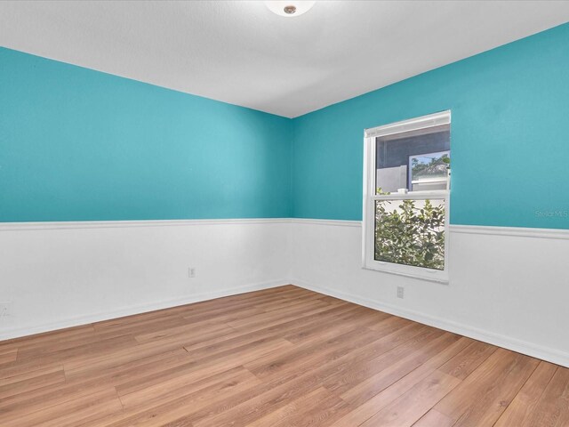 4500 23rd Ave S, Saint Petersburg, FL 33711 - empty room with baseboards and wood finished floors