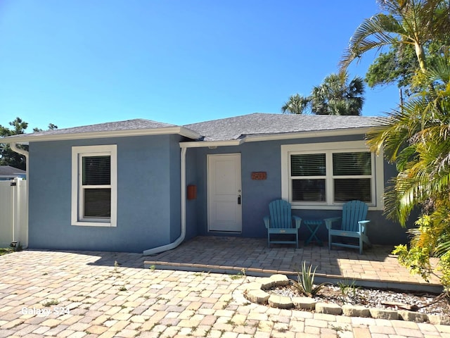 4500 23rd Ave S, Saint Petersburg, FL 33711 - view of front of home with a patio and stucco siding