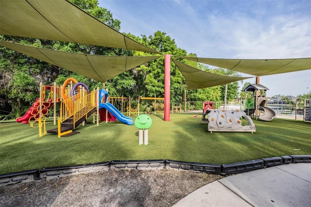 17927 Bahama Isle Cir, Tampa, FL 33647 - community jungle gym featuring a yard