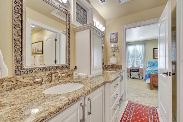 1108 W Charter St, Tampa, FL 33602 - bathroom with double vanity, ensuite bathroom, and tile patterned flooring