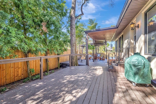 1108 W Charter St, Tampa, FL 33602 - wooden terrace featuring a fenced backyard, area for grilling, and outdoor dining space