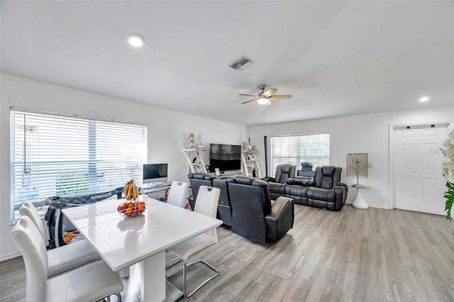 8528 Quarter Horse Dr, Riverview, FL 33578 - dining room featuring light wood-type flooring, ceiling fan, and recessed lighting