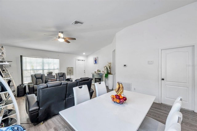8528 Quarter Horse Dr, Riverview, FL 33578 - dining area with wood finished floors and a ceiling fan