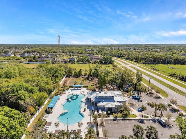 8528 Quarter Horse Dr, Riverview, FL 33578 - drone / aerial view of a pool area and a tree filled landscape