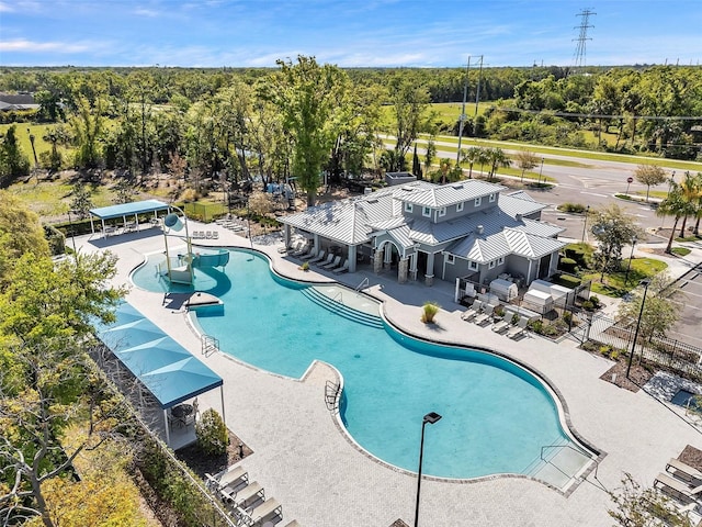 8528 Quarter Horse Dr, Riverview, FL 33578 - community pool featuring a patio area and view of scattered trees