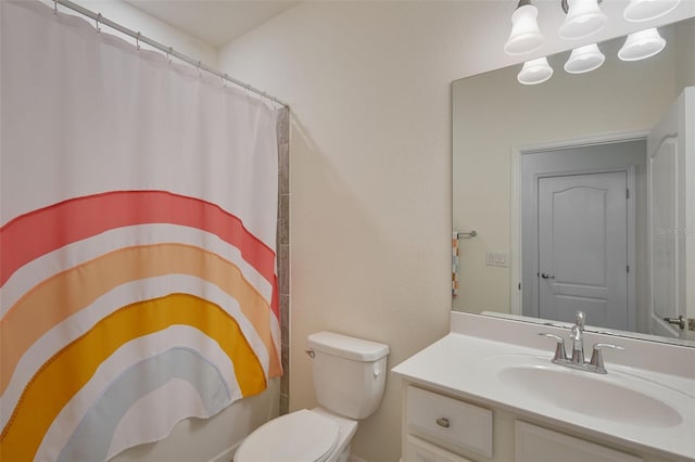 17541 Timberline Pkwy, Punta Gorda, FL 33982 - bathroom with toilet, a shower with shower curtain, and vanity