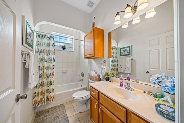 bathroom featuring visible vents, toilet, shower / tub combo with curtain, tile patterned floors, and vanity