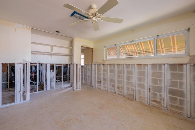 unfurnished room with ceiling fan