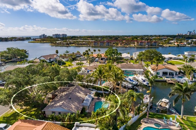 drone / aerial view with a water view