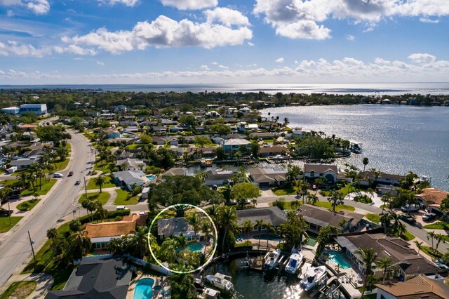 aerial view featuring a water view and a residential view