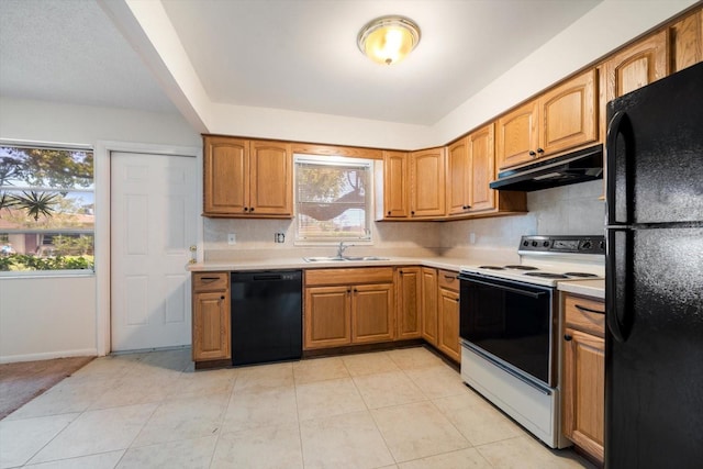 8445 Calais N, Pinellas Park, FL 33781 - kitchen with black appliances, under cabinet range hood, a sink, and plenty of natural light