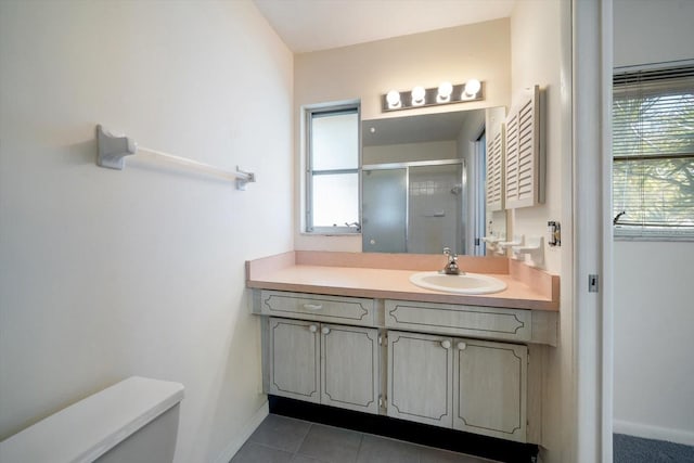 8445 Calais N, Pinellas Park, FL 33781 - bathroom with a stall shower, toilet, vanity, and healthy amount of natural light