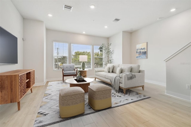 6605 N Nebraska Ave Unit 28, Tampa, FL 33604 - living room with light wood finished floors, baseboards, and recessed lighting