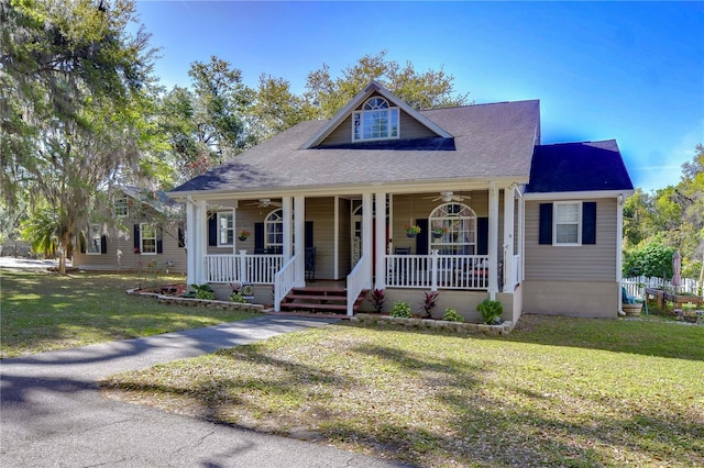 view of front of house featuring a front yard and a porch