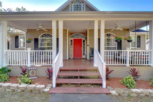 doorway to property with a porch and ceiling fan