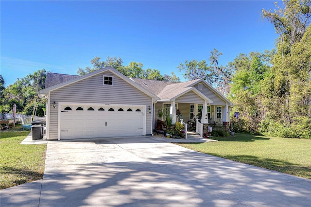 ranch-style home featuring a garage, concrete driveway, a porch, and a front yard