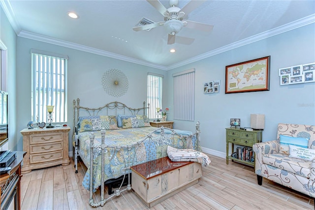 bedroom with light wood-style flooring, crown molding, baseboards, and recessed lighting