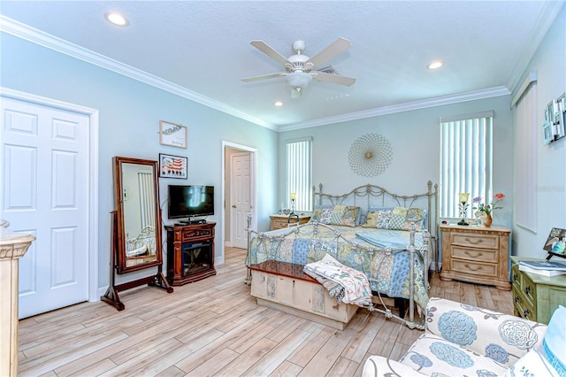 bedroom featuring recessed lighting, ornamental molding, ceiling fan, and wood finished floors