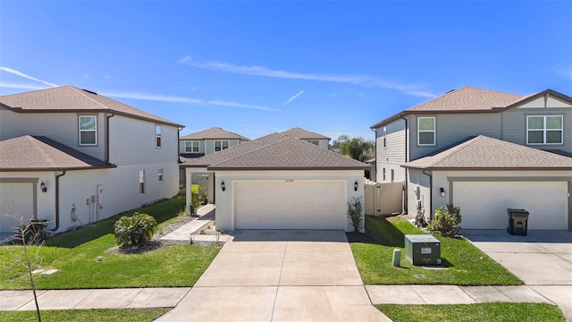 30364 Marquette Ave, Wesley Chapel, FL 33545 - traditional-style home featuring an attached garage, a shingled roof, concrete driveway, and a front yard