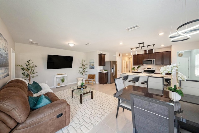 30364 Marquette Ave, Wesley Chapel, FL 33545 - living room with visible vents, recessed lighting, and light tile patterned floors