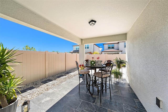 30364 Marquette Ave, Wesley Chapel, FL 33545 - view of patio / terrace with a fenced backyard and outdoor dining area