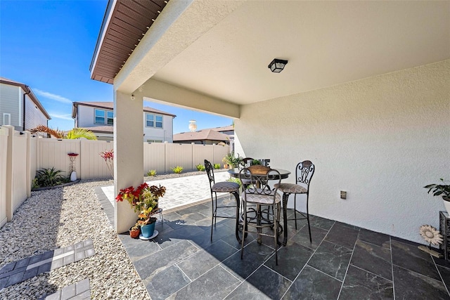 30364 Marquette Ave, Wesley Chapel, FL 33545 - view of patio with outdoor dining area and a fenced backyard