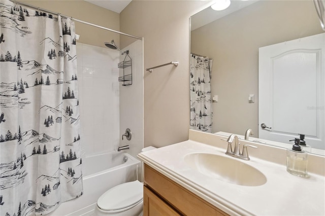 bathroom featuring toilet, shower / bath combo, and vanity
