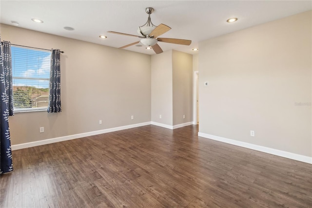 unfurnished room with ceiling fan, dark wood-type flooring, recessed lighting, and baseboards