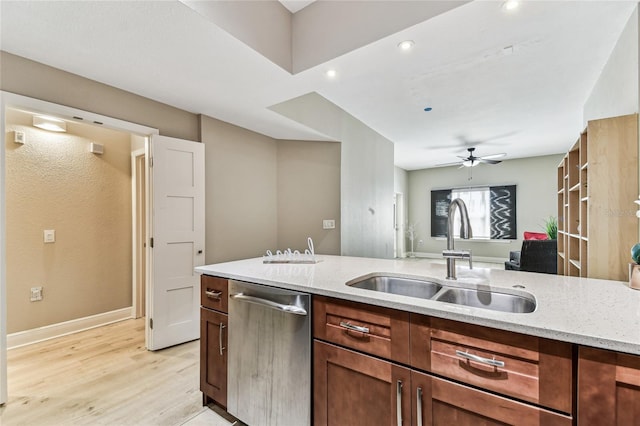100 4th Ave S Unit 220, Saint Petersburg, FL 33701 - kitchen with dishwasher, light stone counters, light wood-style flooring, ceiling fan, and recessed lighting