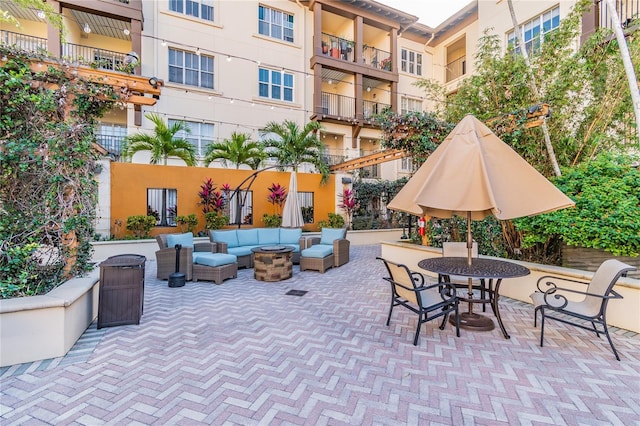 100 4th Ave S Unit 220, Saint Petersburg, FL 33701 - view of patio / terrace featuring an outdoor living space