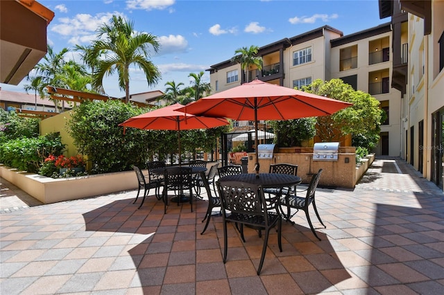 100 4th Ave S Unit 220, Saint Petersburg, FL 33701 - view of patio / terrace with area for grilling and outdoor dining area