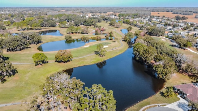 aerial view featuring golf course view and a water view