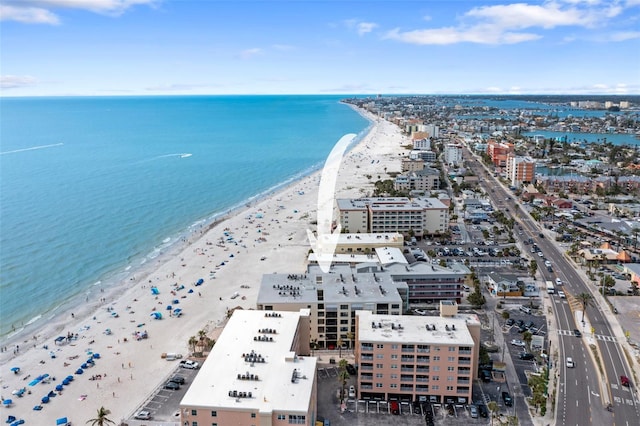 aerial view with a water view, a view of the beach, and a view of city