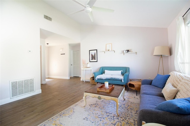 12140 74th St, Largo, FL 33773 - living room with lofted ceiling, ceiling fan, visible vents, and wood finished floors