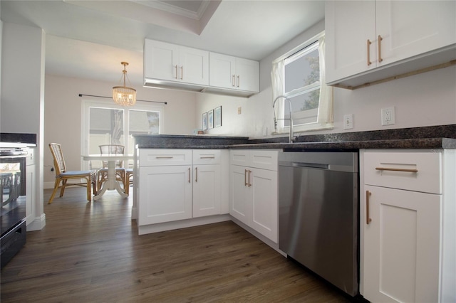 12140 74th St, Largo, FL 33773 - kitchen featuring white cabinetry, a healthy amount of sunlight, and stainless steel dishwasher