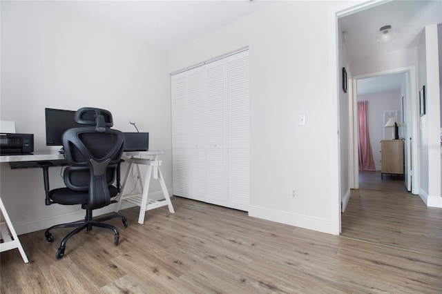12140 74th St, Largo, FL 33773 - home office with baseboards and wood finished floors