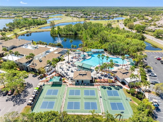 drone / aerial view with a water view