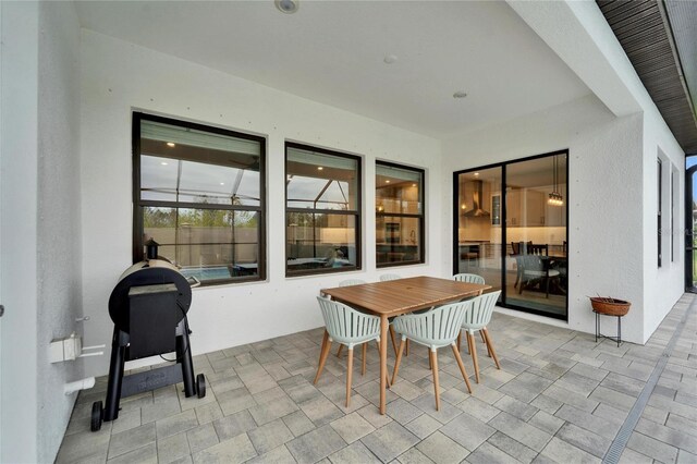 view of patio with outdoor dining space