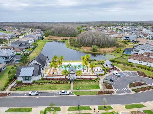 aerial view with a water view and a residential view