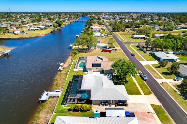 aerial view featuring a residential view and a water view