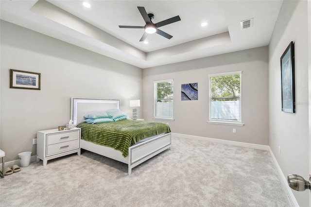 4307 Dristol Ave, Spring Hill, FL 34609 - carpeted bedroom featuring visible vents, baseboards, ceiling fan, recessed lighting, and a raised ceiling