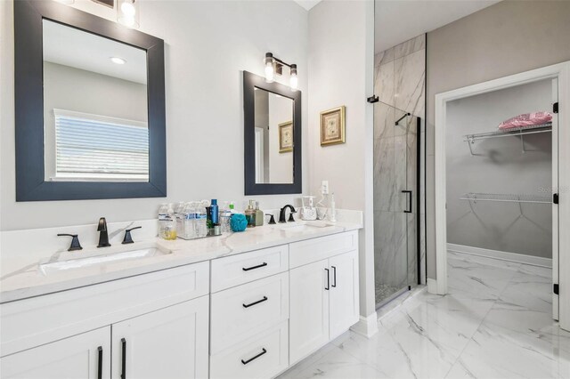 4307 Dristol Ave, Spring Hill, FL 34609 - bathroom with marble finish floor, a sink, a walk in closet, and a shower stall