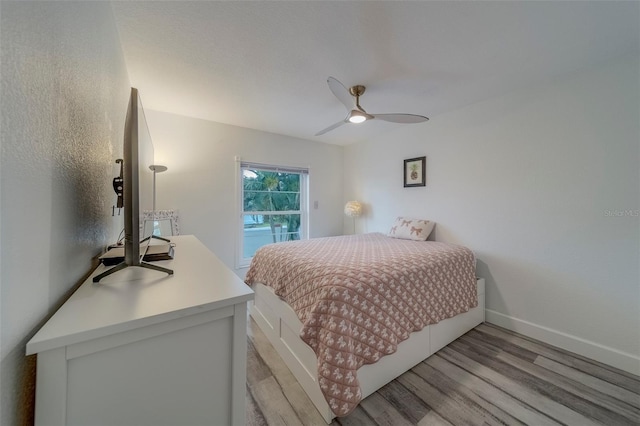 2700 Bayshore Blvd Unit 588, Dunedin, FL 34698 - bedroom featuring light wood-style floors and a ceiling fan