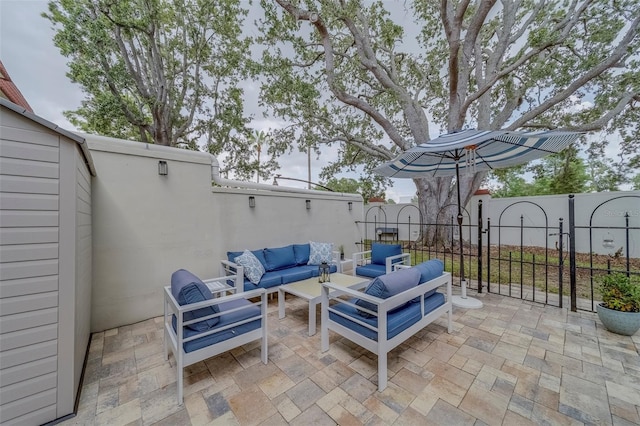 2700 Bayshore Blvd Unit 588, Dunedin, FL 34698 - view of patio / terrace with outdoor lounge area and a gate