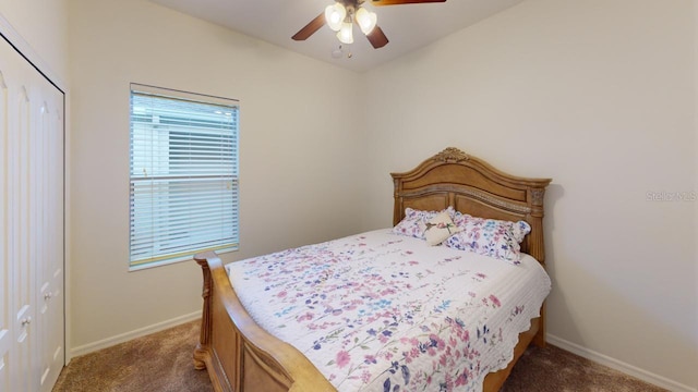 11822 Crawford Parrish Ln, Parrish, FL 34219 - bedroom featuring dark colored carpet, baseboards, a closet, and ceiling fan