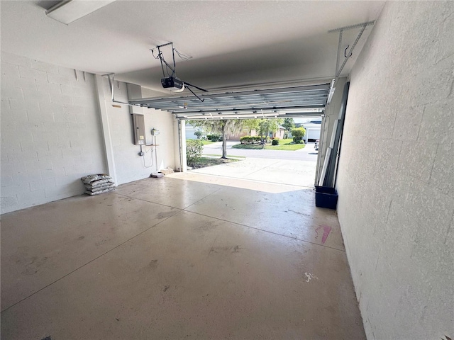 11822 Crawford Parrish Ln, Parrish, FL 34219 - garage featuring a garage door opener and electric panel