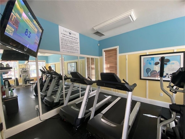 11822 Crawford Parrish Ln, Parrish, FL 34219 - workout area featuring baseboards