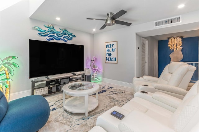 living area with recessed lighting, a ceiling fan, baseboards, and marble finish floors